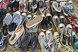 Second-hand shoes for sale at the Saturday market in Klong Ngae - Click for larger image Second-hand shoes for sale at the Saturday market in Klong Ngae - Click for larger image